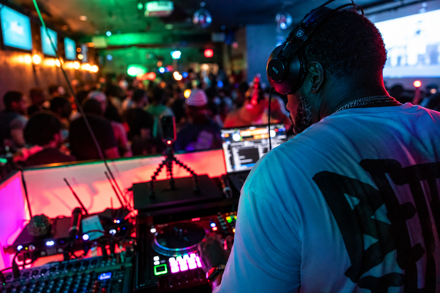 SoYourDolo DJing in a packed nightlife setting